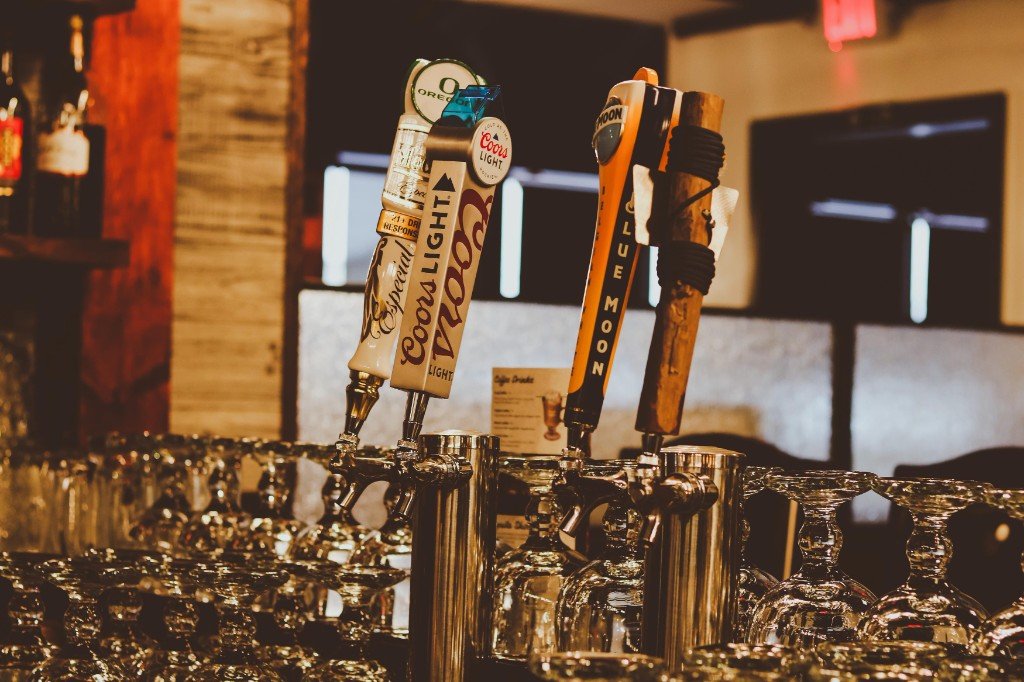 Draft beer taps at Tequila Fuego bar Coors Light Blue Moon and margarita glasses Longview Washington