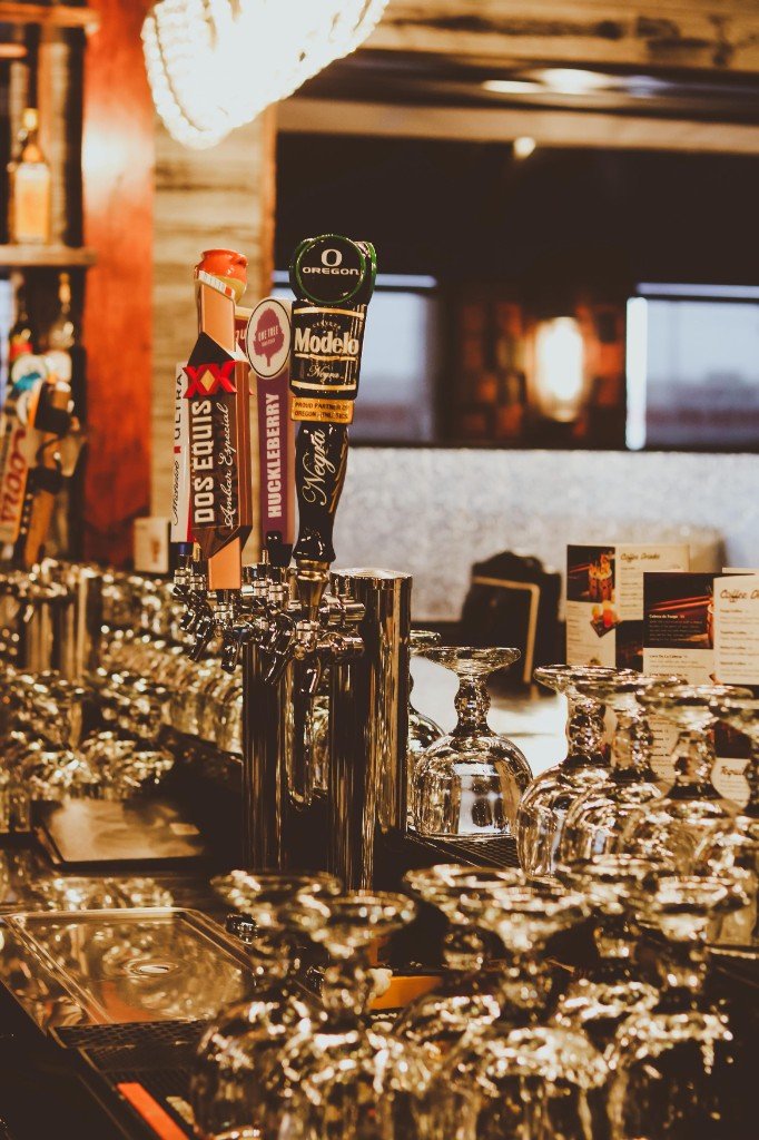 Bar taps at Tequila Fuego Longview featuring Dos Equis Ambar, Huckleberry Cider and Modelo Negra with clean glassware