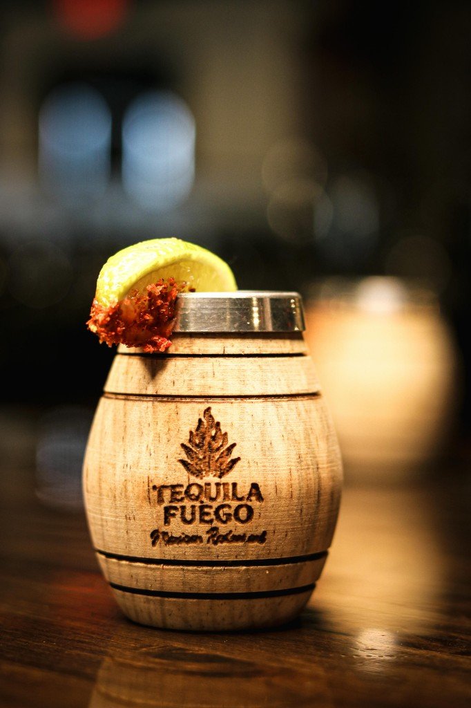 Signature branded barrel mug with chili-lime rim at Tequila Fuego Mexican restaurant Longview